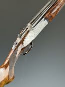 Rizzini 12 bore over and under ejector shotgun with engraved scenes of birds to the sidelock