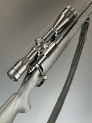 Winchester Model 70 .223 Remington bolt-action rifle with composite stock, chequered semi-pistol