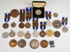Twenty three shooting medals including The National Rifle Association, Windsor Forest Bowmen, The
