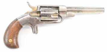 Bacon Arms Company .32 rimfire five-shot single-action revolver with sheath trigger, shaped wooden