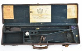 Leather bound shotgun case with Holland & Holland oil bottle, fitted interior and three labels