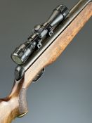 Gamo Magnum .22 air rifle with textured semi-pistol grip, raised cheek piece and SMK 4x32 scope,