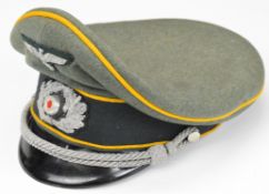 German WW2 Nazi Third Reich officer's green peaked cap, with yellow piping to surround and VRL to
