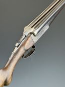 Thomas Wild 12 bore side by side shotgun with named locks, engraved dogs and birds to the locks