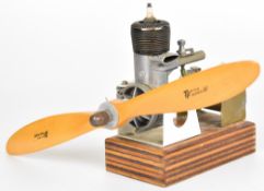 Vintage Ohlsson & Rice spark ignition model aircraft petrol engine, on stand with fuel tank, overall