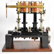 Large twin cylinder live steam engine with solid flywheel, Stephenson's link reversing gear and drip