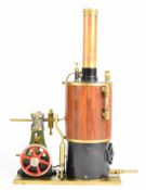 Stuart 10V live steam plant comprising engine with spoked flywheel, hand pump, gas burner and lagged