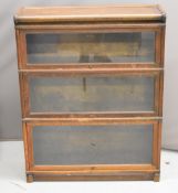 Globe Wernicke glazed oak three tier bookcase, W87 x D30 x H108cm