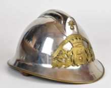 French Adrian pattern chrome plated fireman's helmet with brass 'Sapeurs Pompiers Nantes' plaque and