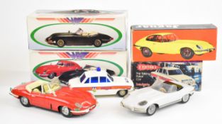 Three battery and friction operated model Jaguar cars, together with a 'Z Cars' Z Victor 4 police
