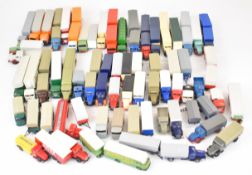 Fifty mostly Wiking 1:87 scale plastic bodied haulage vehicles, many with double trailers, the