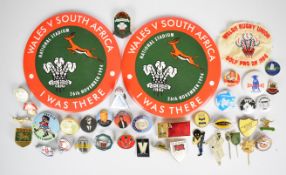 Collection of sport, pop and music related badges including Madness, Kylie, NME Glastonbury 92,