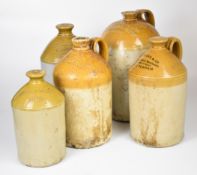 Five stoneware flagons comprising L Price Nailsworth, two Godsell and Sons Stroud, Cooke