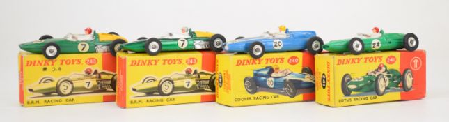 Four Dinky diecast model racing cars comprising Cooper 240, Lotus 241 and two BRM 243, all in