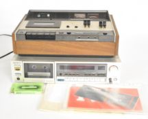 Two vintage stereo cassette decks comprising Sony TC-K555 and Akai GXC-46D, both with original
