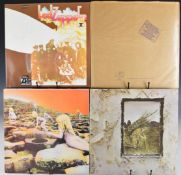 Six Led Zeppelin LPs comprising Houses Of The Holy, In Through The Out Door with brown paper bag,