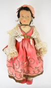 Felt gypsy doll in the style of Lenci, Chad Valley or similar with painted features, braided hair,