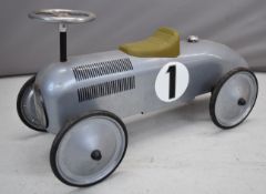 Gollnest & Kiesel ride on pressed steel vintage style racing car with silver body, black trim, olive