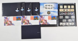 A modern mint Queen Elizabeth II GB collection, six millennium coin cover first day cover packs