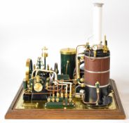 Vision engineering live steam plant, serial number 0122, on display base, comprising single cylinder