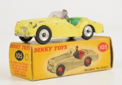 Dinky Toys diecast model Triumph TR2 Sports with lemon body, green interior, driver and silver hubs,