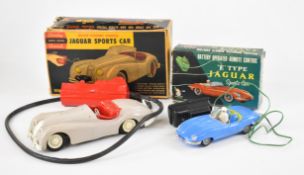 Two vintage remote control Jaguar cars by Marx and Andy Gard (General Molds & Plastics Corp), both