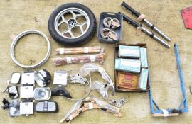 BMW motorcycle parts to include a BMW frame jig, inner tubes, K1100 forks, one K1100 wheel,