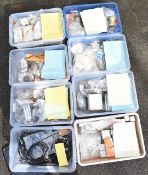 Eight boxes of new old stock BMW motorcycle parts to include wheel bearings, rocker arms, control