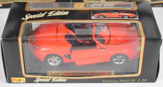 Eight Maisto 1:18 scale diecast model sports cars to include Dodge Concept Vehicle, Jaguar XJ220,