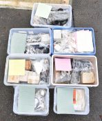 Seven boxes of new old stock BMW motorcycle parts to include piston rings, inlet valves,