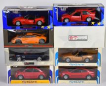 Eight UT Models and Gate 1:18 scale diecast metal sports cars to include McLaren F1, Ford Escort