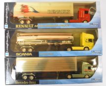 Three Newray 'Longhauler Collection' 1:32 scale diecast model lorries or trucks comprising Scania