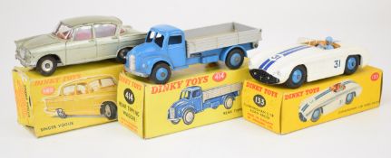 Three Dinky Toys diecast model cars comprising Singer Vogue 145, Cunningham C-5R Road Racer 133