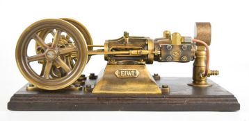 Polish made Eiwi twin cylinder live steam engine with twin spoked flywheels, on wooden base with