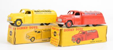 Two Dinky Toys diecast model Studebaker tanker trucks comprising Mobilgas 400 and National Benzole