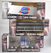 Six Revel Metal 1:24 scale diecast model heavy goods vehicles comprising four Peterbilt trucks and