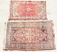 Persian wool rug and a Heriz rug, 68 x 94cm and 130 x 73cm