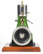 John Bertinat Stuart No. 4 vertical single cylinder live steam engine with solid flywheel, oil