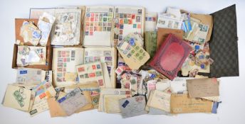 A very large collection of stamps in envelopes and various albums, mostly kiloware