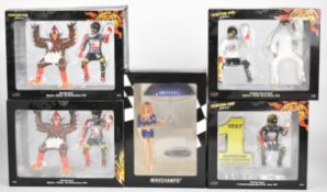 Five Paul's Model Art Minichamps 1:12 scale MotoGP resin figurines comprising four Valentino Rossi