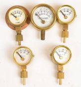 Five small live steam pressure gauges comprising Stuart 1 inch 0-100psi example, Stuart 0-150psi