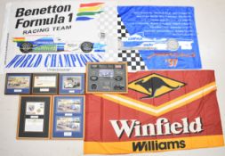 Formula One, land speed and similar framed ephemera to include signed items by Jackie Stewart, Nigel
