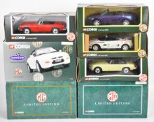 Seven Corgi 1:18 scale diecast model MG cars, all in original boxes.