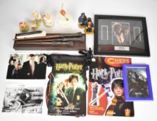 Harry Potter collectibles including three magic wands, one boxed, Goblet of Fire film cell,