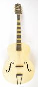 1940's Harmony 'Artist Model' archtop acoustic guitar with mother of pearl fretwork and rear mounted