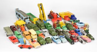 Forty-five vintage Dinky diecast model cars, trucks, military and agricultural vehicles to include