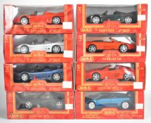 Eight Mira 1:18 scale diecast model Ferrari and Lamborghini sports cars comprising two 512 TR