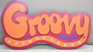 Illuminated wooden 'Groovy' fairground sign, approximately 68 x 125cm at largest