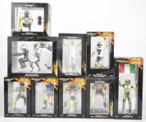 Nine Paul's Model Art Minichamps 'Valentino Rossi Collection' 1:12 scale MotoGP resin figurines, all