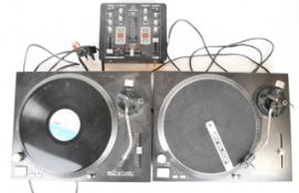 A pair of Reloop RP-2000M direct drive turntables together with a Behringer VMX100USB 2 channel DJ